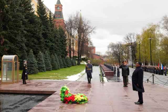 Congo-Brazzaville's President Denis Sassou N'Guesso (R) attends a wreath-laying ceremony at the Tomb of the Unknown Soldier by the Kremlin Wall in Moscow on April 29, 2026. (Photo by Pavel Bednyakov / POOL / AFP)