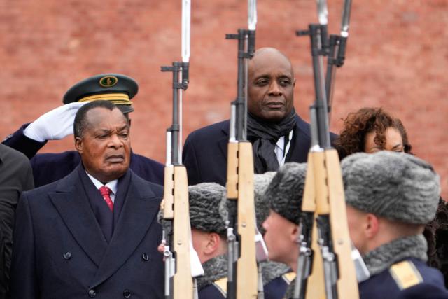 Congo-Brazzaville's President Denis Sassou N'Guesso (L) attends a wreath-laying ceremony at the Tomb of the Unknown Soldier by the Kremlin Wall in Moscow on April 29, 2026. (Photo by Pavel Bednyakov / POOL / AFP)