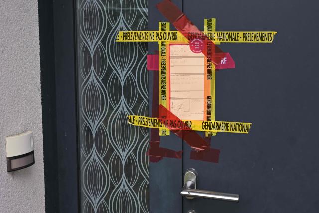 This photograph shows the seals on the house of missing 31-year-old mother Manon Relandeau, in Saint-Etienne-de-Montluc, western France, on April 29, 2026. The gendarmerie reported an “escalation” in the resources deployed to locate Manon Relandeau, a young mother from the Nantes area who may have been killed, following the arrest of her partner in Algeria. Since April 27, 2026, drones from the IRCGN (National Gendarmerie Criminal Research Institute) have been deployed, a gendarmerie Captain said at a press conference. (Photo by Damien MEYER / AFP)