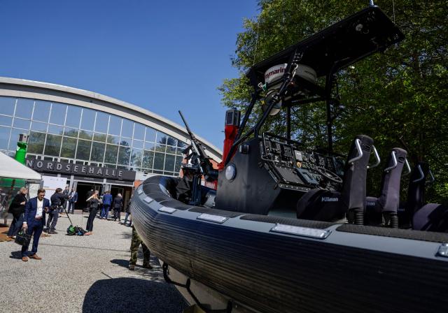 An armed speedboat of the German armed forces (Bundeswehr) stands in front of the venue of the German National Maritime Conference in Emden, northern Germany, on April 29, 2026. The National Maritime Conference (NMK) is the Federal Government’s central event for supporting the maritime industry, attended by around 800 representatives from business, politics and science, and has established itself as a driver of new ideas and a platform for exchange. It has been held every two years since 2000. (Photo by FOCKE STRANGMANN / AFP)