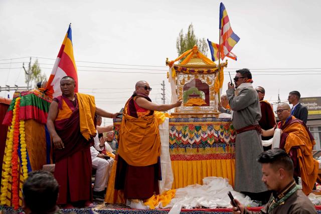 Monks take part in a religious procession upon the arrival of sacred relics linked to the Buddha in Leh on April 29, 2026. (Photo by Mohd Arhaan ARCHER / AFP)
