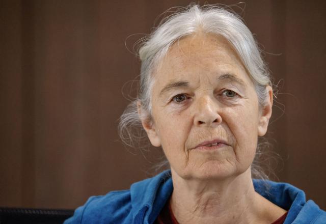 (FILES) Daniela Klette, former member of German far-left militant group The Red Army Faction (RAF), sits in the courtroom in Verden an der Aller near Bremen, northern Germany, as her trial for armed robbery and attempted murder goes on, on June 18, 2025. Prosecutors on April 29,, 2026 called for Klette to be sentenced to 15 years in jail for a series of armed robberies said to have been carried out to support herself while she was on the run. Prosecutors accuse Daniela Klette of carrying out eight attacks between 1999 and 2016 alongside two other former RAF members. (Photo by Focke Strangmann / POOL / AFP)