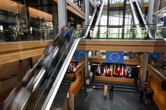 This slow shutter speed photograph shows the lobby of the European Parliament in Strasbourg, eastern France, on April 29, 2026. (Photo by SEBASTIEN BOZON / AFP)