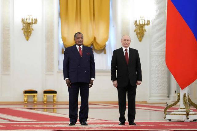 Russia's President Vladimir Putin (R) and Congo-Brazzaville's President Denis Sassou N'Guesso (L) pose for a photo prior to their talks in Moscow on April 29, 2026. (Photo by Pavel Bednyakov / POOL / AFP)