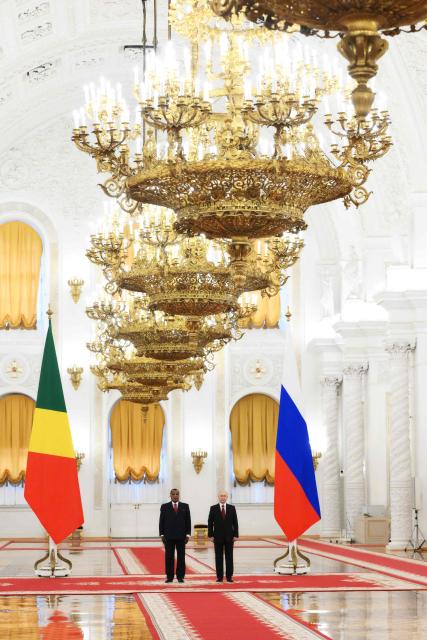 In this pool photograph distributed by the Russian state agency Sputnik, Russia's President Vladimir Putin (R) and Congo-Brazzaville's President Denis Sassou N'Guesso (L) pose for a photo prior to their talks in Moscow on April 29, 2026. (Photo by Grigory SYSOYEV / POOL / AFP)