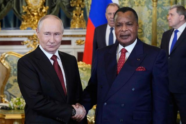 Russia's President Vladimir Putin (L) shakes hands with Congo-Brazzaville's President Denis Sassou N'Guesso (R) during their meeting in Moscow on April 29, 2026. (Photo by Alexander Zemlianichenko / POOL / AFP)