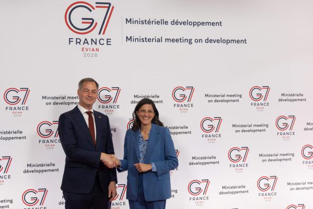 France's Minister Delegate for Francophonie Eleonore Caroit (R) welcomes Administrator of United Nations Development Programme Alexander De Croo (L) during a G7 Environment Ministers' meeting in Paris on April 29, 2026. The G7 Development Ministers’ Meeting takes place on 29 and 30 April 2026 in Paris. (Photo by Christophe PETIT TESSON / POOL / AFP)
