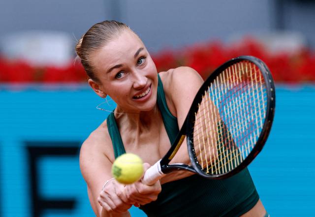 Austria's Anastasia Potapova returns the ball to Czech Republic's Karolina Pliskova during her 2026 WTA Tour Madrid Open tennis tournament singles match against Czech Republic's Karolina Pliskova at the Caja Magica in Madrid, on April 29, 2026. (Photo by OSCAR DEL POZO / AFP)
