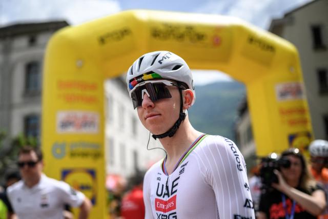 UAE Team Emirates-XRG's Slovenian rider Tadej Pogacar arrives for the teams' presentation prior to the first stage of the Tour of Romandie UCI cycling World tour, a 171.2 km loop from Martigny-Ville to Martigny-Ville, in Martigny on April 29, 2026. (Photo by Fabrice COFFRINI / AFP)