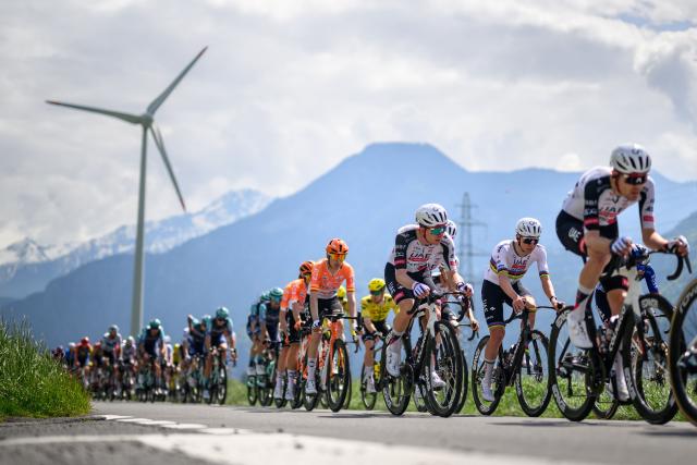 UAE Team Emirates-XRG's Slovenian rider Tadej Pogacar (2nd R) rides with the pack during the first stage of the Tour of Romandie UCI cycling World tour, a 171.2 km loop from Martigny-Ville to Martigny-Ville, in Collonges, on April 29, 2026. (Photo by Fabrice COFFRINI / AFP)