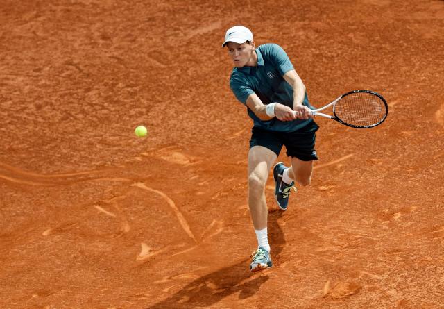 Italy's Jannik Sinner returns a ball to Spain's Rafael Jodar during their 2026 ATP Tour Madrid Open tennis tournament quarterfinal singles match at the Caja Magica in Madrid, on April 29, 2026. (Photo by OSCAR DEL POZO / AFP)