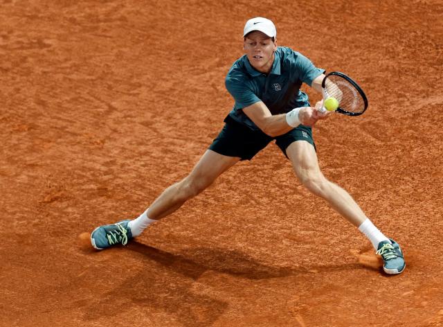 Italy's Jannik Sinner returns a ball to Spain's Rafael Jodar during their 2026 ATP Tour Madrid Open tennis tournament quarterfinal singles match at the Caja Magica in Madrid, on April 29, 2026. (Photo by OSCAR DEL POZO / AFP)