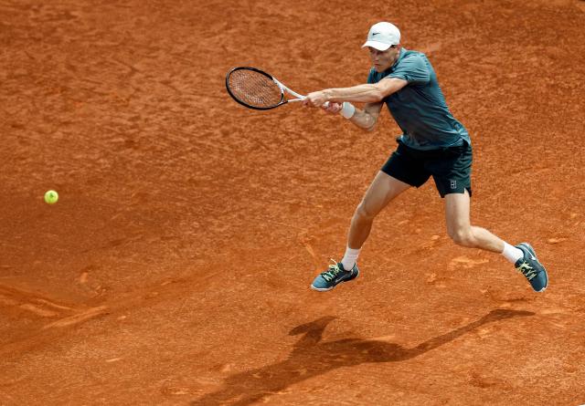 Italy's Jannik Sinner returns a ball to Spain's Rafael Jodar during their 2026 ATP Tour Madrid Open tennis tournament quarterfinal singles match at the Caja Magica in Madrid, on April 29, 2026. (Photo by OSCAR DEL POZO / AFP)