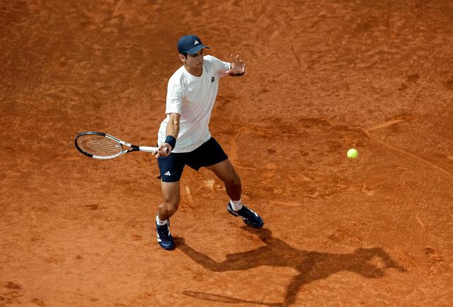 Spain's Rafael Jodar returns a ball to Italy's Jannik Sinner during their 2026 ATP Tour Madrid Open tennis tournament quarterfinal singles match at the Caja Magica in Madrid, on April 29, 2026. (Photo by OSCAR DEL POZO / AFP)