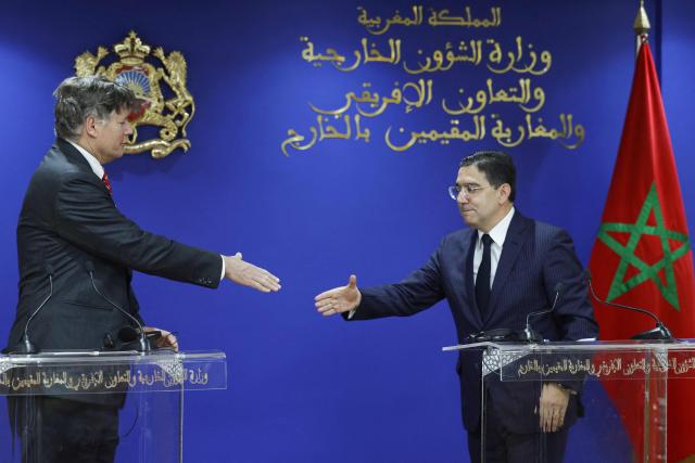 Morocco's Foreign Minister Nasser Bourita (R) and US Deputy Secretary of State Christopher Landau (L) shake hands during their meeting in Rabat on April 29, 2026. (Photo by Abdel Majid BZIOUAT / AFP)