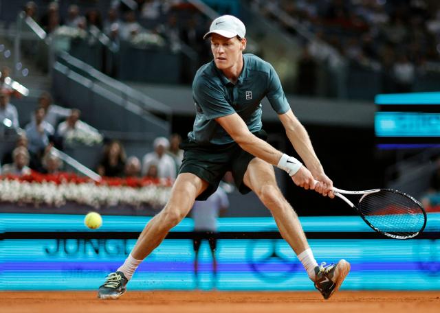 Italy's Jannik Sinner returns a ball to Spain's Rafael Jodar during their 2026 ATP Tour Madrid Open tennis tournament quarterfinal singles match at the Caja Magica in Madrid, on April 29, 2026. (Photo by OSCAR DEL POZO / AFP)