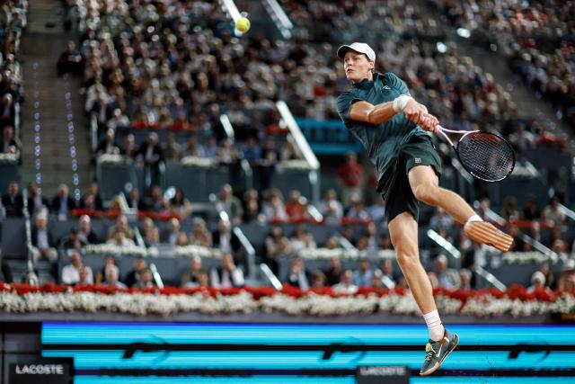 Italy's Jannik Sinner returns a ball to Spain's Rafael Jodar during their 2026 ATP Tour Madrid Open tennis tournament quarterfinal singles match at the Caja Magica in Madrid, on April 29, 2026. (Photo by OSCAR DEL POZO / AFP)