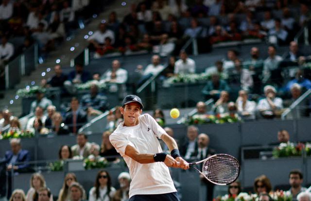 Spain's Rafael Jodar returns a ball to Italy's Jannik Sinner during their 2026 ATP Tour Madrid Open tennis tournament quarterfinal singles match at the Caja Magica in Madrid, on April 29, 2026. (Photo by OSCAR DEL POZO / AFP)