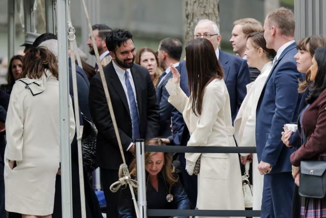 New York City Mayor Zohran Mamdani speaks with an attendee as he arrives at the 9/11 Memorial ahead of a visit by Britain's King Charles III and Queen Camilla in New York on April 29, 2026. (Photo by Jeenah Moon / POOL / AFP)