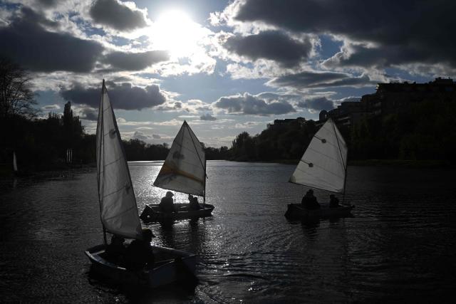 Children practice sailing on a lake in Warsaw, Poland on April 29, 2026. (Photo by Sergei GAPON / AFP)