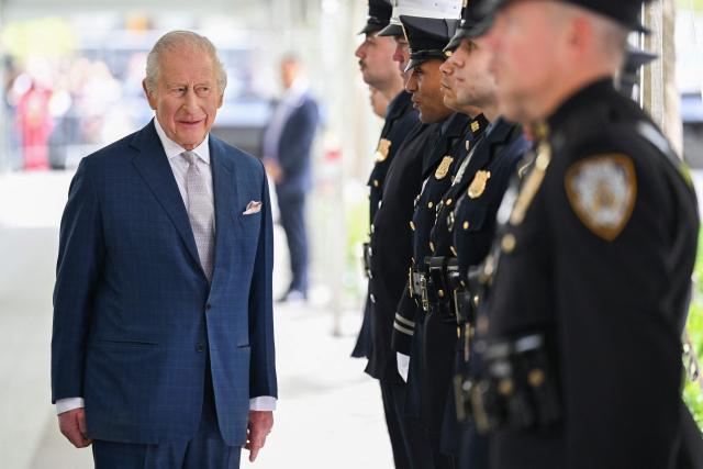 Britain's King Charles III meets the families of victims and first responders who were involved in the rescue efforts after the attacks, as well as currently serving personnel during a ceremony at the National September 11 Memorial on day three of their State Visit to the United States of America, on April 29, 2026 in New York City.. (Photo by Samir HUSSEIN / POOL / AFP)