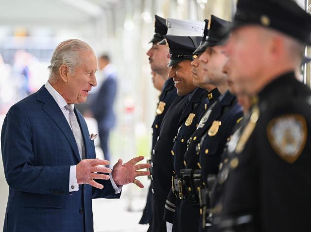 Britain's King Charles III meets the families of victims and first responders who were involved in the rescue efforts after the attacks, as well as currently serving personnel during a ceremony at the National September 11 Memorial on day three of their State Visit to the United States of America, on April 29, 2026 in New York City.. (Photo by Samir HUSSEIN / POOL / AFP)