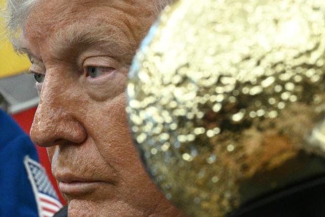 US President Donald Trump speaks as he welcomes the Artemis II astronauts in the Oval Office at the White House in Washington, DC, on April 29, 2026. (Photo by Brendan SMIALOWSKI / AFP)