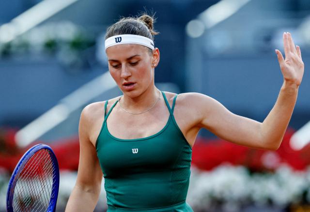 Ukraine's Marta Kostyuk reacts to winning a point against Czech Republic's Linda Noskova during their 2026 WTA Tour Madrid Open tennis tournament  quarter-final singles match at the Caja Magica in Madrid, on April 29, 2026. (Photo by OSCAR DEL POZO / AFP)