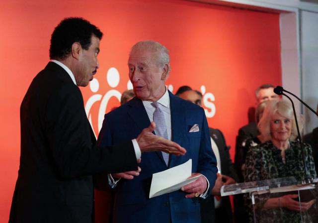 US singer Lionel Richie speaks with Britain's King Charles III during the Greater Together Reception, partner of King’s Trust at Christie's in New York, on April 29, 2026. (Photo by Suzanne Plunkett / POOL / AFP)