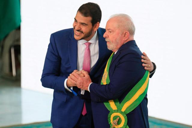 (FILES) Brazil's new President Luiz Inacio Lula da Silva (R) poses for a picture with Attorney General of the Union Jorge Messias during the induction ceremony of the members of his cabinet, at Planalto Palace in Brasilia on January 1, 2023, after his inauguration ceremony. On April 29, 2026, the Brazilian Senate rejected Jorge Messias, President Luiz Inacio Lula da Silva’s nominee for a seat on the Supreme Court, marking a setback for the president just months before the presidential election. (Photo by Sergio LIMA / AFP)