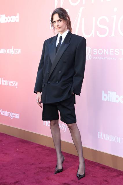 British model Cara Delevingne attends Billboard Women in Music at the Hollywood Palladium in Los Angeles on April 29, 2026. (Photo by VALERIE MACON / AFP)