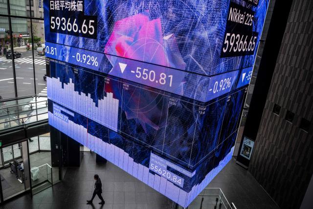 An electronic quotation board displays the Nikkei 225 index on the Tokyo Stock Exchange in Tokyo on April 30, 2026. (Photo by Philip FONG / AFP)