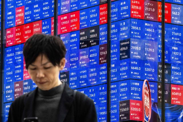An electronic quotation board displays the Nikkei 225 stock prices on the Tokyo Stock Exchange in Tokyo on April 30, 2026. (Photo by Philip FONG / AFP)