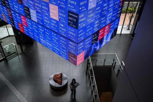 An electronic quotation board displays the Nikkei 225 stock prices on the Tokyo Stock Exchange in Tokyo on April 30, 2026. (Photo by Philip FONG / AFP)