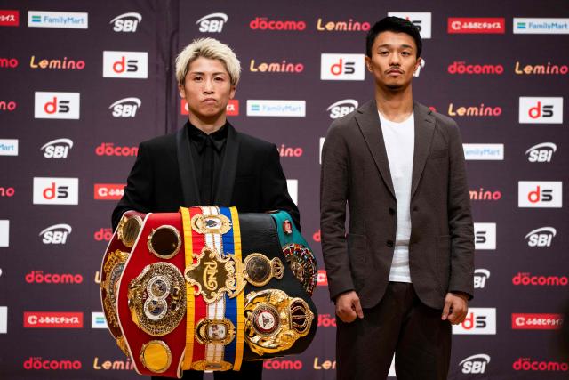 Japanese boxer Naoya Inoue (L), the current unified WBA, WBC, IBF, and WBO world superbantamweight champion, and his compatriot Junto Nakatani pose during a press conference ahead of their May 2 boxing match, in Tokyo on April 30, 2026. (Photo by Yuichi YAMAZAKI / AFP)