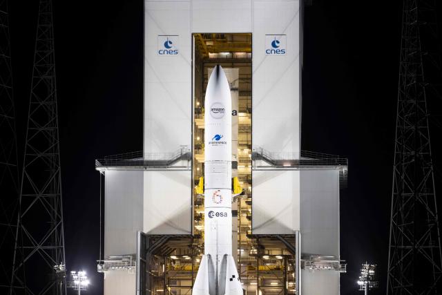 This photograph shows the Arianespace's Ariane 6 rocket carrying the Amazon Leo LE-02 payload ahead of its launching as part of Flight VA268, at the Guiana Space Centre in Kourou, on the French overseas department of Guiana on April 30, 2026. (Photo by RONAN LIETAR / AFP)