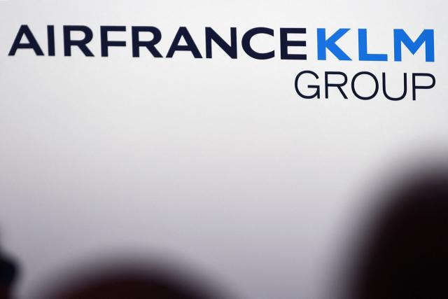 (FILES) The Air France-KLM group's new logo is pictured during the group's 2018 financial year presentation in Paris on February 20, 2019. The Franco-Dutch aviation giant Air France-KLM lowered its forecasts for 2026 on April 30, 2026 due to the war in the Middle East, anticipating slower growth as fuel costs are set to soar. (Photo by ERIC PIERMONT / AFP)