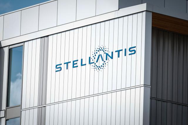 (FILES) A photo shows a company logo at the Stellantis multinational car manufacturer's plant in Poissy, west of Paris, on April 15, 2026. Global automaker Stellantis -- owner of the Jeep and Fiat brands -- said on April 30, 2026 it had swung back into profit in the first quarter on rising sales as it fixed manufacturing and operational problems. The Franco-Italian-American firm which also owns the Peugeot and Chrysler brands posted a net profit of 377 million euros ($440 million) in January through March, compared to a loss of 387 million euros in the same period last year. (Photo by Simon Wohlfahrt / AFP)