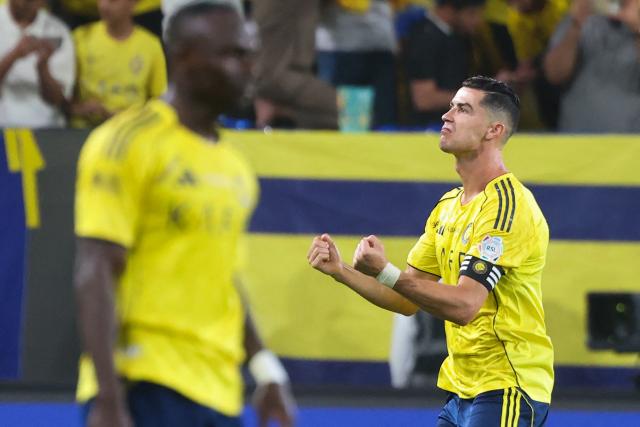 TOPSHOT - Nassr's Portuguese forward #07 Cristiano Ronaldo celebrates after scoring his team's first goal during the Saudi Pro League football match between Al-Nassr and Al-Ahli at the Al-Awwal Park Stadium in Riyadh on April 29, 2026. (Photo by Fayez NURELDINE / AFP)