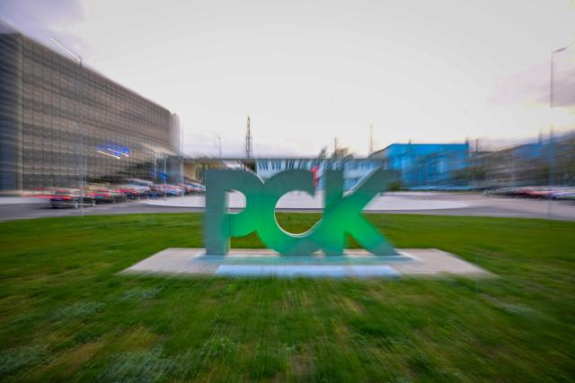 The logo of the PCK Schwedt refinery in Schwedt, northeastern Germany, is seen at the company's plant on April 30, 2026, one day before Russia will halt the pipeline flow of Kazakh oil to Germany, citing technical reasons. The stoppage from May 1, 2026 will impact the PCK refinery, run by the German subsidiary of Russia's state-owned oil company Rosneft, that supplies much of the Berlin region and the capital's international airport with fuel. The move by Moscow comes amid Russia's war against Ukraine and a global energy crisis sparked by the US-Israeli war against Iran, which has caused major disruptions to global oil and gas markets. The German government stressed it does not expect an energy supply crunch. (Photo by Tobias SCHWARZ / AFP)