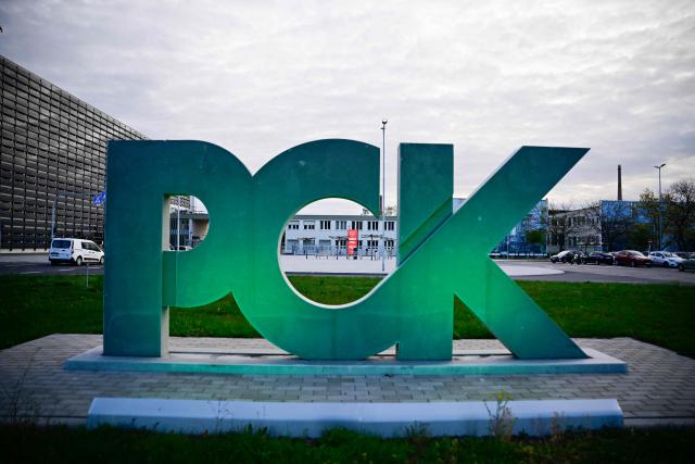 The logo of the PCK Schwedt refinery in Schwedt, northeastern Germany, is seen at the company's plant on April 30, 2026, one day before Russia will halt the pipeline flow of Kazakh oil to Germany, citing technical reasons. The stoppage from May 1, 2026 will impact the PCK refinery, run by the German subsidiary of Russia's state-owned oil company Rosneft, that supplies much of the Berlin region and the capital's international airport with fuel. The move by Moscow comes amid Russia's war against Ukraine and a global energy crisis sparked by the US-Israeli war against Iran, which has caused major disruptions to global oil and gas markets. The German government stressed it does not expect an energy supply crunch. (Photo by Tobias SCHWARZ / AFP)