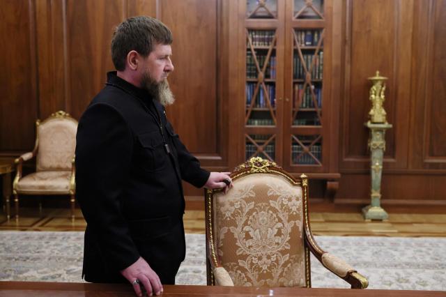 In this pool photograph distributed by the Russian state agency Sputnik, Chechen leader Ramzan Kadyrov meets with Russia's President at the Kremlin in Moscow late on April 29, 2026. (Photo by Mikhail METZEL / POOL / AFP) / Editor's note : this image is distributed by the Russian state owned agency Sputnik