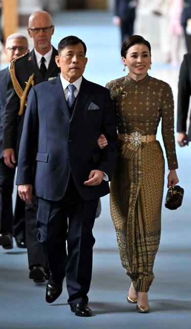 Thai King Rama X (Maha Vajiralongkorn, L) and his wife Suthida Vajiralongkorn arrive at the Royal Chapel inside the Palace in Stockholm, Sweden, on April 30, 2026, to attend the "Te Deum" thanksgiving service during celebrations to mark the 80th birthday of Sweden's King Carl XVI Gustaf. (Photo by Jonathan Nackstrand / AFP)