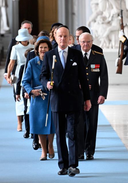 Queen Silvia of Sweden and King Carl XVI Gustaf of Sweden (R) arrive at the Royal Chapel inside the Palace in Stockholm, Sweden, on April 30, 2026, to attend the "Te Deum" thanksgiving service during celebrations to mark the 80th birthday of Sweden's King Carl XVI Gustaf. (Photo by Jonathan Nackstrand / AFP)
