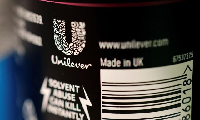 (FILES) The Unilever logo is picture on a bottle of the company's Sure deodorant product, in a shop in London on January 20, 2022. British consumer goods giant Unilever on April 30, 2026 said it was confident of meeting its full-year guidance despite macroeconomic uncertainty. (Photo by Tolga Akmen / AFP)