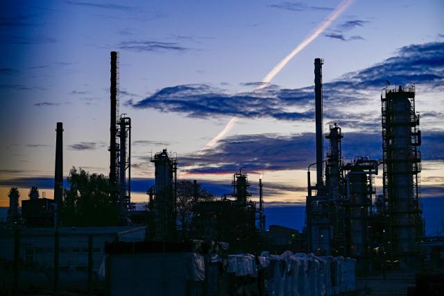 Towers of the facilities of the PCK Schwedt refinery in Schwedt, northeastern Germany, are pictured at the company's plant on early April 30, 2026, one day before Russia will halt the pipeline flow of Kazakh oil to Germany, citing technical reasons. The stoppage from May 1, 2026 will impact the PCK refinery, run by the German subsidiary of Russia's state-owned oil company Rosneft, that supplies much of the Berlin region and the capital's international airport with fuel. The move by Moscow comes amid Russia's war against Ukraine and a global energy crisis sparked by the US-Israeli war against Iran, which has caused major disruptions to global oil and gas markets. The German government stressed it does not expect an energy supply crunch. (Photo by Tobias SCHWARZ / AFP)