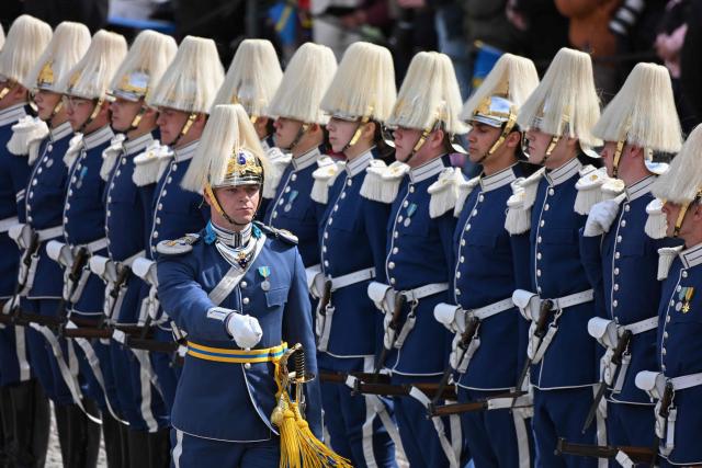 Meebers of the royal guard line up at the Royal Palace in Stockholm, Sweden, on April 30, 2026, during celebrations to mark the 80th birthday of Sweden's King Carl XVI Gustaf. (Photo by Jonathan Nackstrand / AFP)