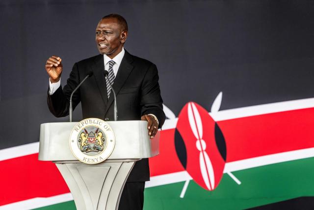 Kenya's President William Ruto delivers a speech on stage during a congratulatory ceremony for Kenyan marathon runner Sabastian Sawe at State House in Nairobi, on April 30, 2026, to celebrate his victory at the London Marathon after breaking a historic world record. Sabastian Sawe became the first man to run under two hours for a marathon in race conditions thanks to extraordinary talent, a punishing training regime, and the lightest shoes in history. In London on April 26, 2026, the 31-year-old Kenyan achieved one of sport's milestones, ranking alongside Roger Bannister's first sub-four minute mile in 1954. (Photo by Luis TATO / AFP)
