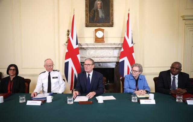 (L to R) Britain's Home Secretary Shabana Mahmood, Metropolitan Police Commissioner Mark Rowley, Britain's Prime Minister Keir Starmer, CEO of the Judicial Office Michelle Crotty and Deputy Prime Minister David Lammy attend a meeting of criminal justice agencies following the Golders Green attack the day before, in Downing Street in central London on April 30, 2026. The UK government on April 30 announced an extra 25 million pound (33 million USD) for security outside synagogues and schools, a day after two Jews were stabbed in the latest attack on the community. (Photo by Dan Kitwood / POOL / AFP)