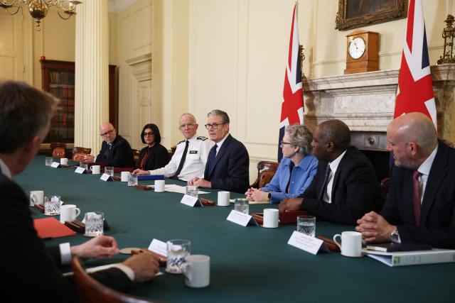 Britain's Prime Minister Keir Starmer (C) convenes a meeting of criminal justice agencies following the Golders Green attack the day before, in Downing Street in central London on April 30, 2026. The UK government on April 30 announced an extra 25 million pound (33 million USD) for security outside synagogues and schools, a day after two Jews were stabbed in the latest attack on the community. (Photo by Dan Kitwood / POOL / AFP)